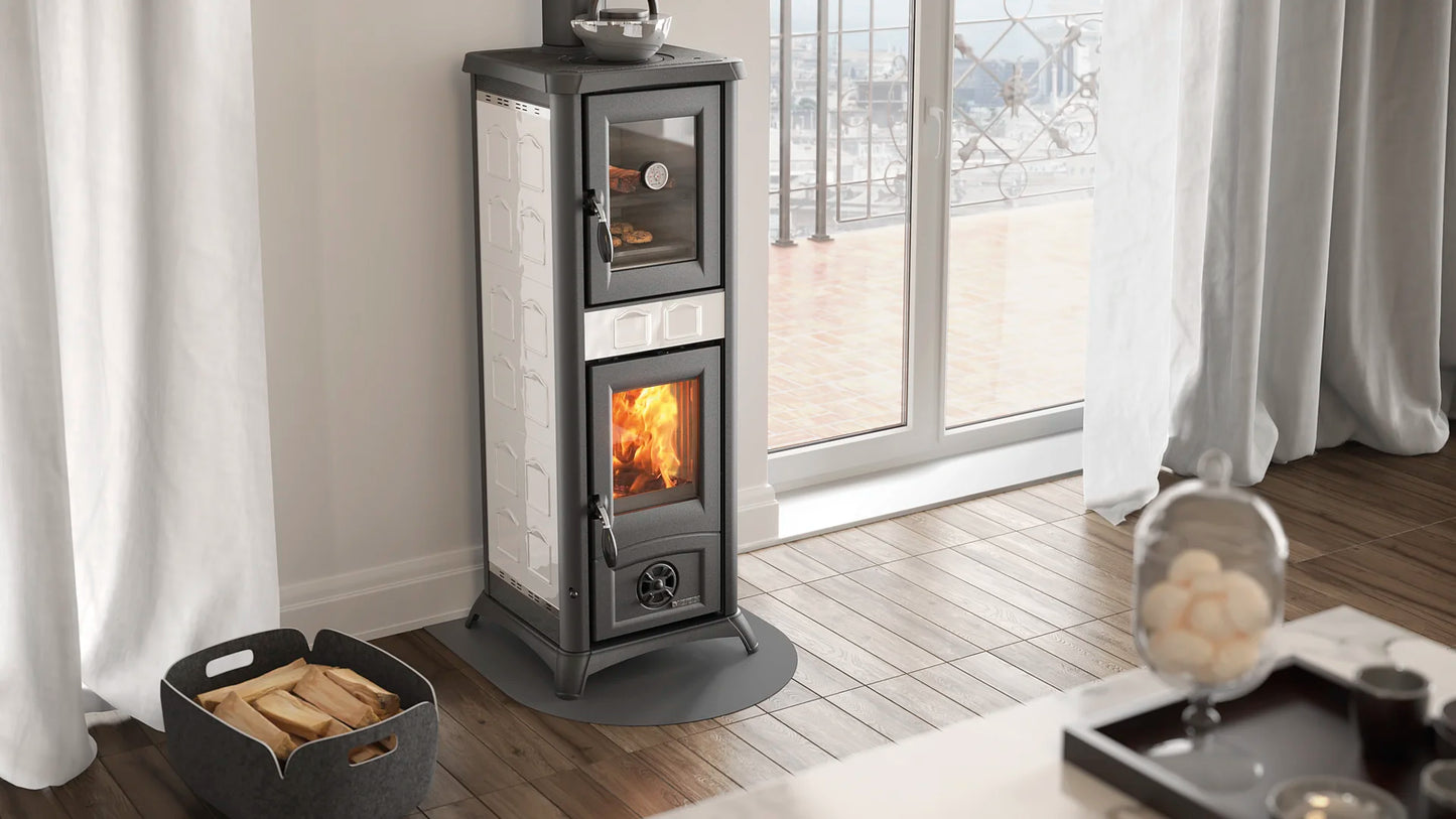 Wood-burning stove with oven in white colour in a room