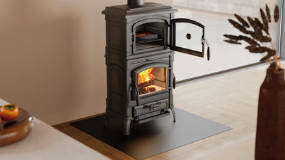 Wood stove with open door in a kitchen setting