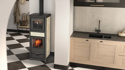 Wood-burning stove in a kitchen with black and white checkered floor