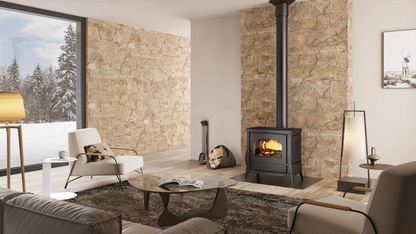 Modern living room with stone walls, a fireplace, and decorative items.