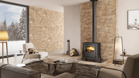 Modern living room with stone walls, a fireplace, and decorative items.