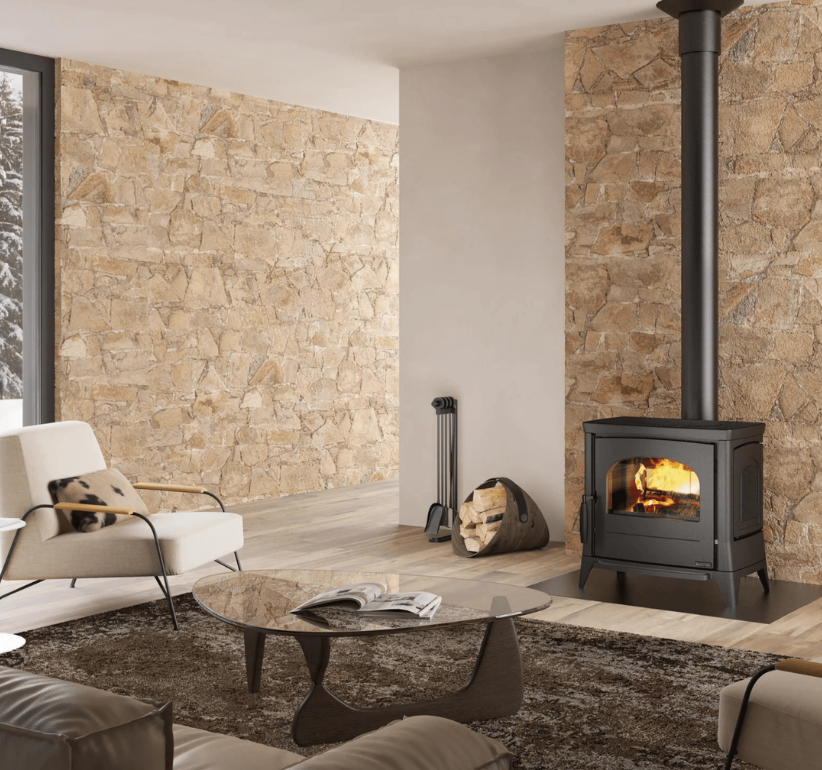Modern living room with stone walls, a fireplace, and minimal decor.